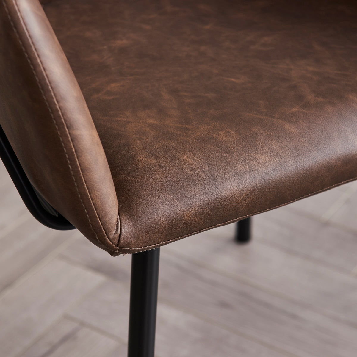 Reagan Saddle Brown Vegan Leather Carver Chairs - Set of 2 - Black Metal Legs