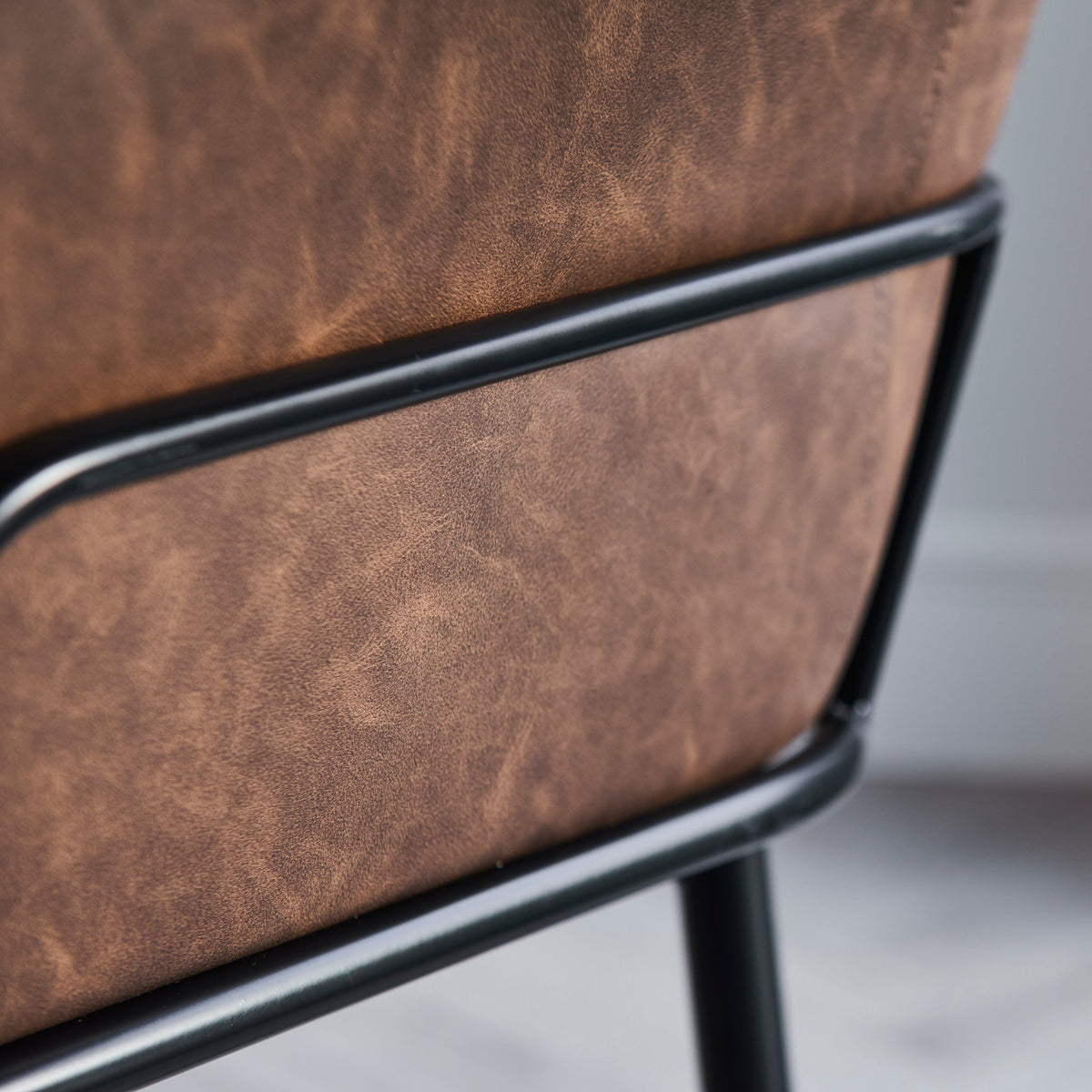 Reagan Saddle Brown Vegan Leather Carver Chairs - Set of 2 - Black Metal Legs