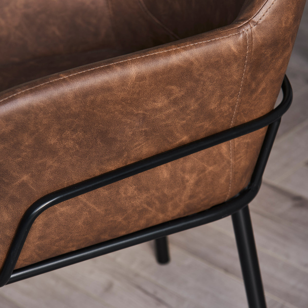Reagan Saddle Brown Vegan Leather Carver Chairs - Set of 2 - Black Metal Legs