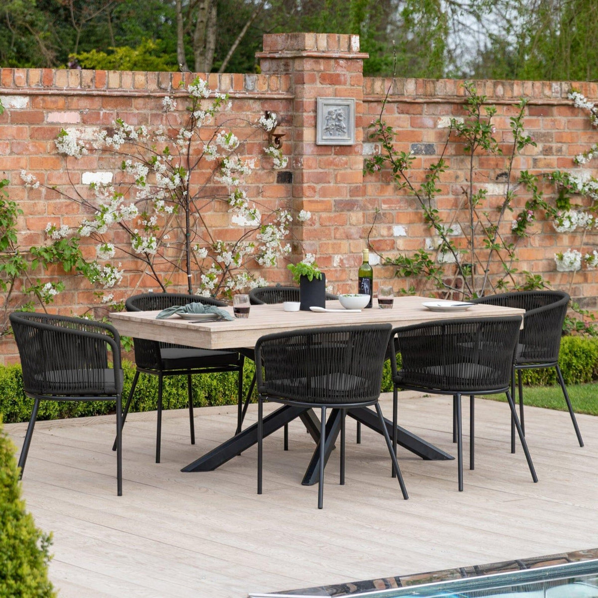 Amelia 6 Seater Wooden Garden Dining Set with 6 Hali Black Chairs - Light Brushed Acacia with Black Legs