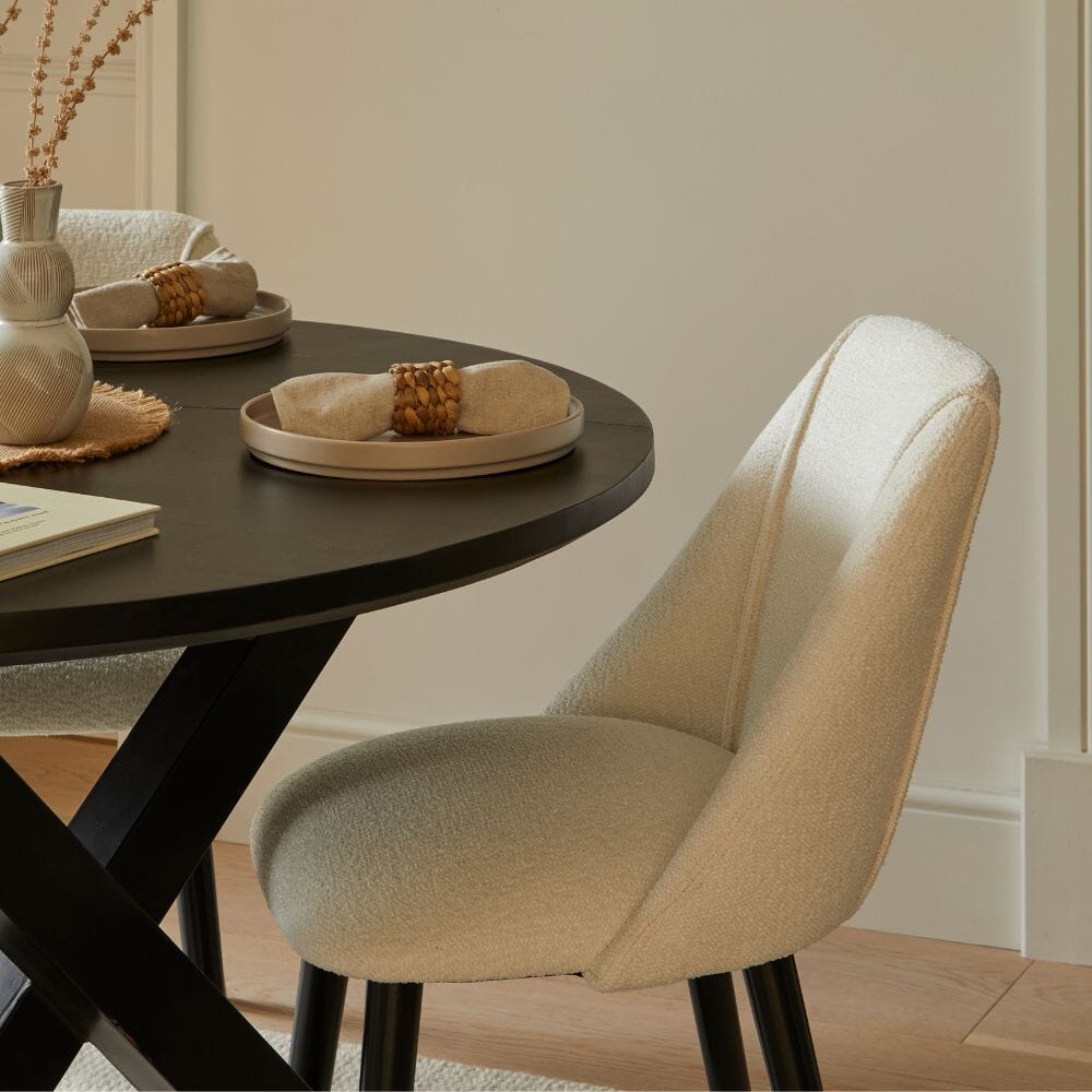 Levi Black Round Dining Table Set - 4 Seater - Freya Boucle Dining Chairs with Black Legs
