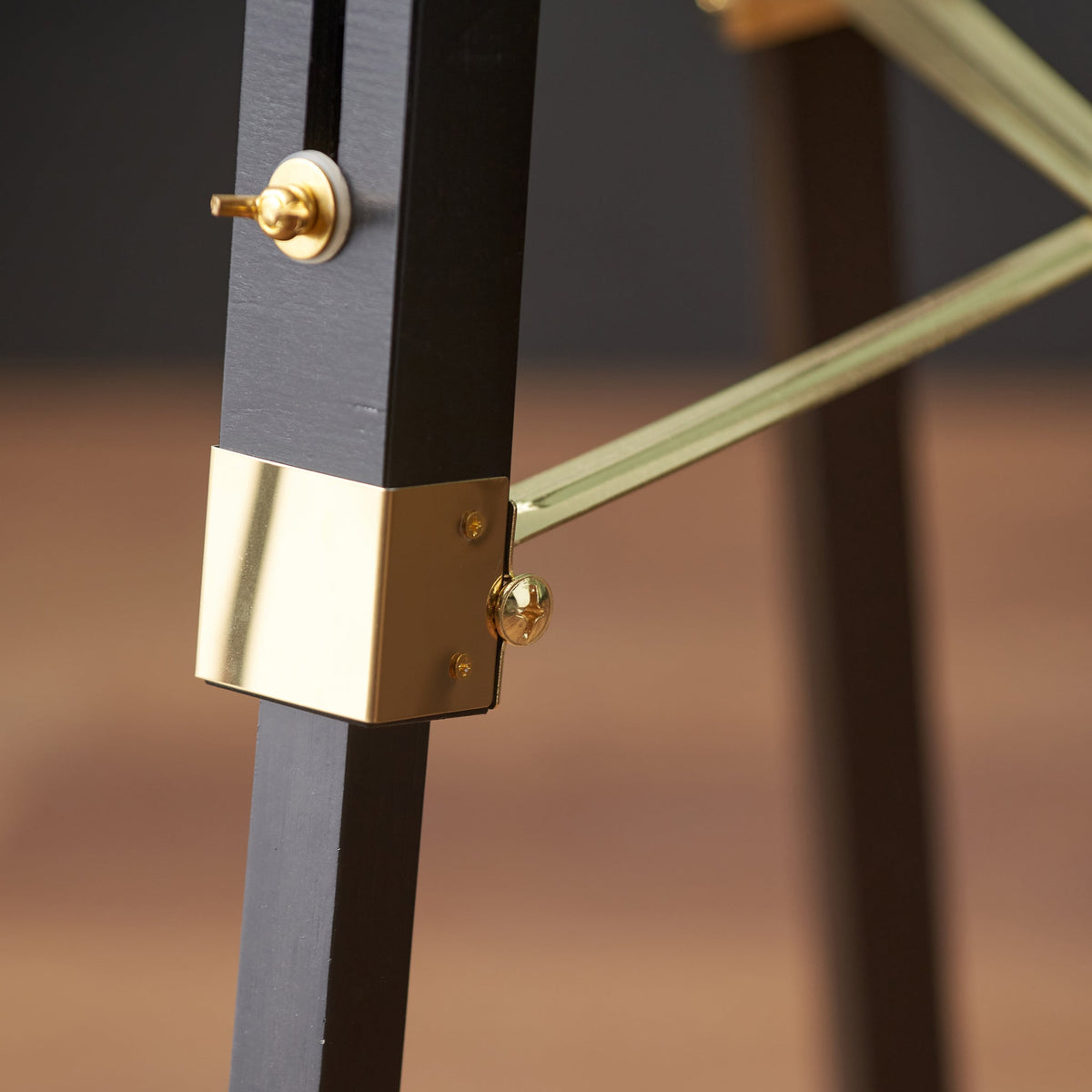 Hereford Gold and Black Tripod Film Floor Lamp