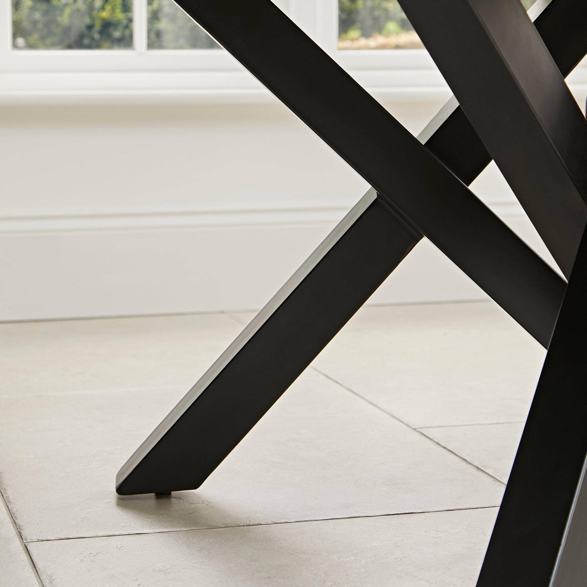 Levi Black Round Dining Table Set - 4 Seater - Freya Boucle Armchairs with Black Legs