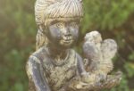 Sitting Girl with Fairy Resin Garden Statue Stone Effect 23cm - Image 3